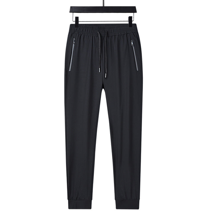 Men's sporty training pants with functional zippered pockets Mune Fashion