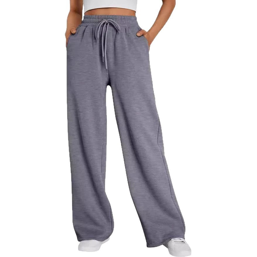 Women's wide lounge pants with high elastic waistband, adjustable drawstring and flowing palazzo silhouette Mune Fashion