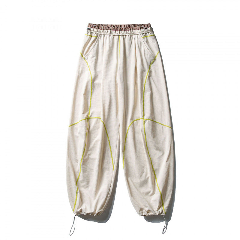 Unisex locker cut tech jogging pants with elastic waistband, distinctive flatlock seams and drawstring Mune Fashion