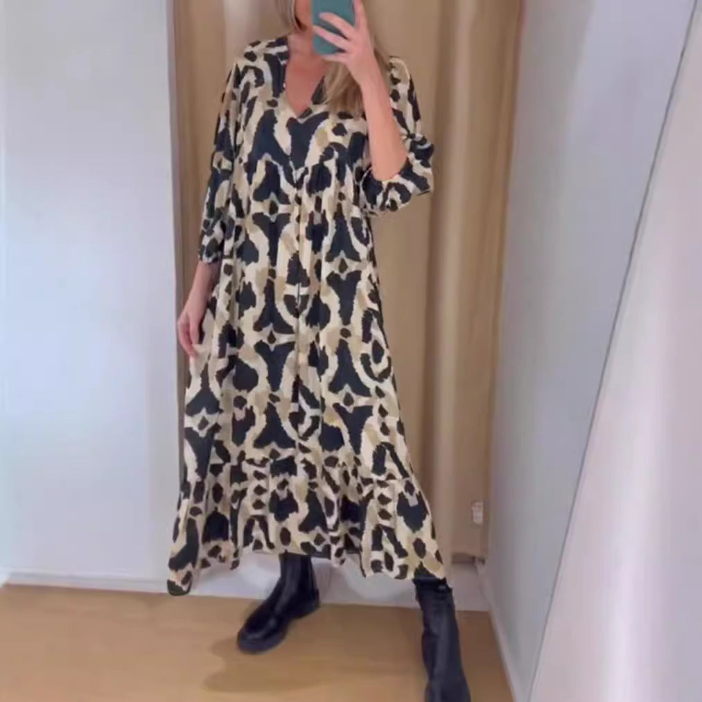 Women's flowing tiered maxi dress with V-neck, gathered bust panel and three-quarter sleeves Mune Fashion