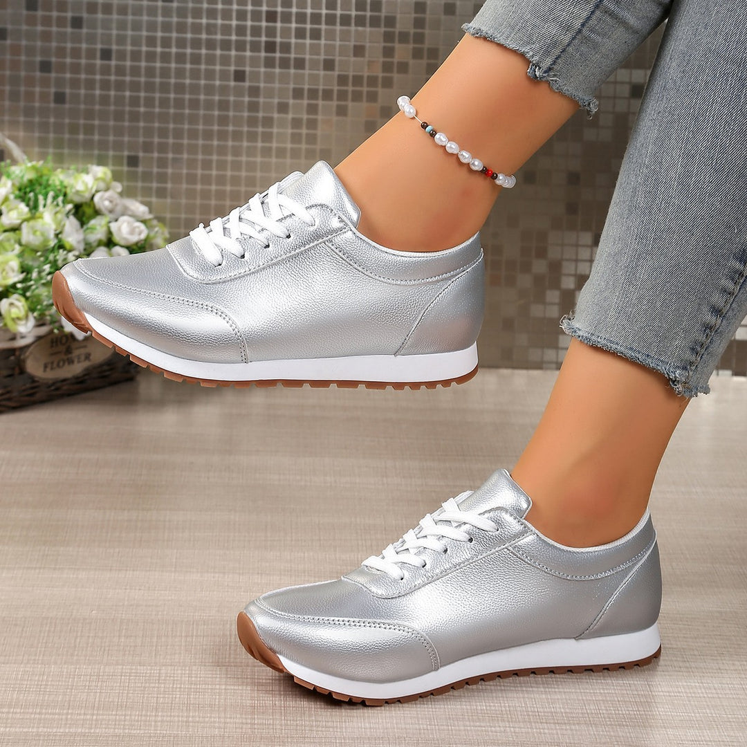 Women's lightweight lace-up sneakers made of synthetic leather with padded comfort insole and profiled rubber sole Mune Fashion