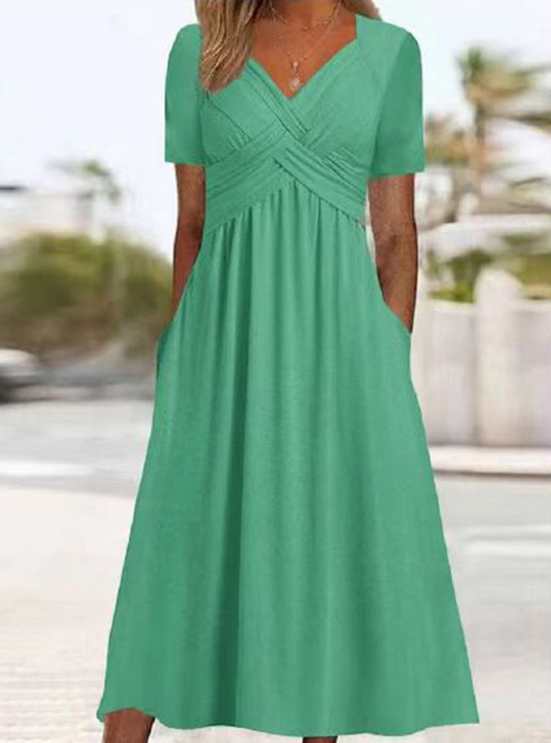 Women's flowing maxi dress with crossed yoke V-neck short sleeves and side pockets Mune Fashion