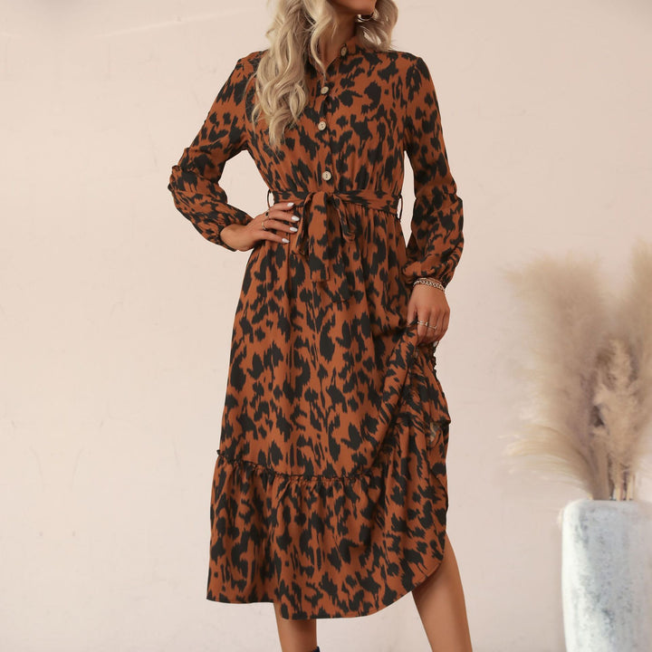 Women’s midi dress with animal print, button placket, waist belt and tiered skirt Mune Fashion