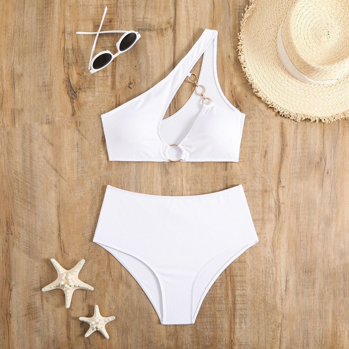 Women's bikini set with asymmetrical strap cut and elegant ring detail Mune Fashion