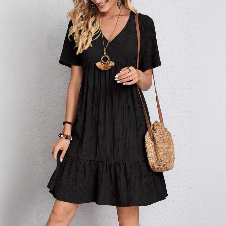 Women nan Crinkle summer dress with V-neck, empire seam and ruffle hem Mune Fashion