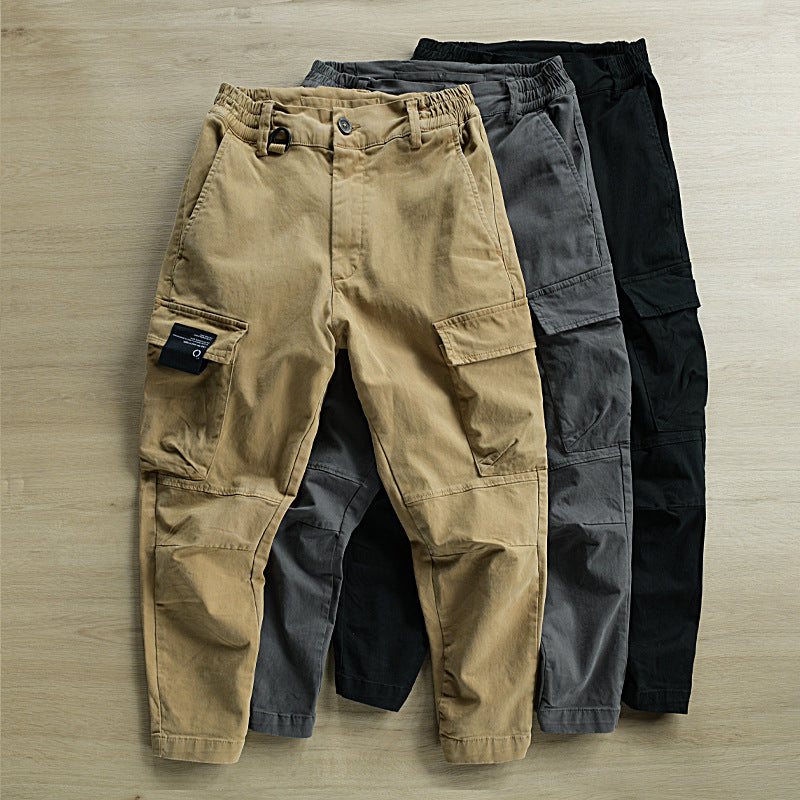 Men's cargo pants with tapered leg, elastic waistband, and reinforced knee inserts Mune Fashion