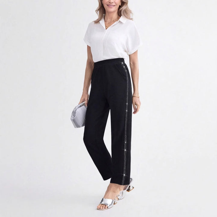 Women Elegant straight-cut fabric pants with elastic waistband and side glitter trim Mune Fashion