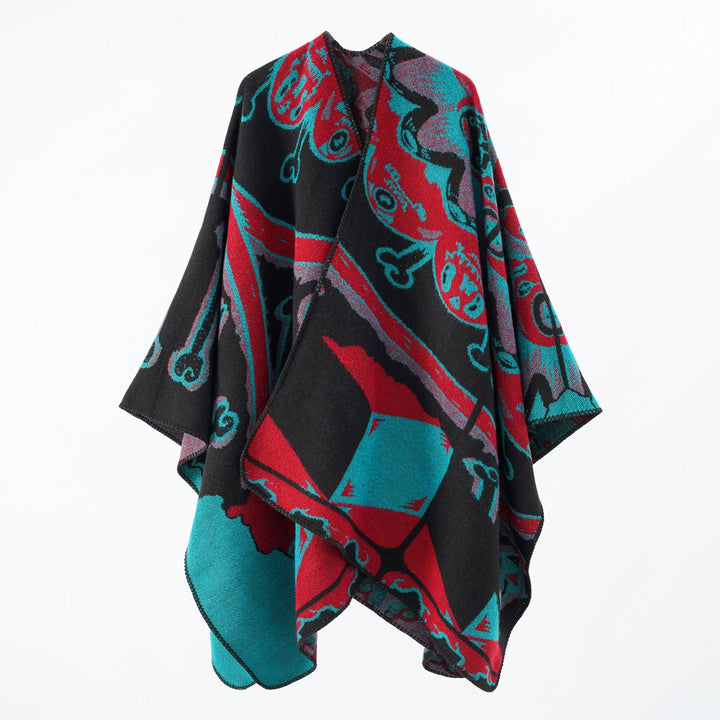 Women's statement cape poncho made from jacquard woven wool blend with skull and bone pattern Mune Fashion