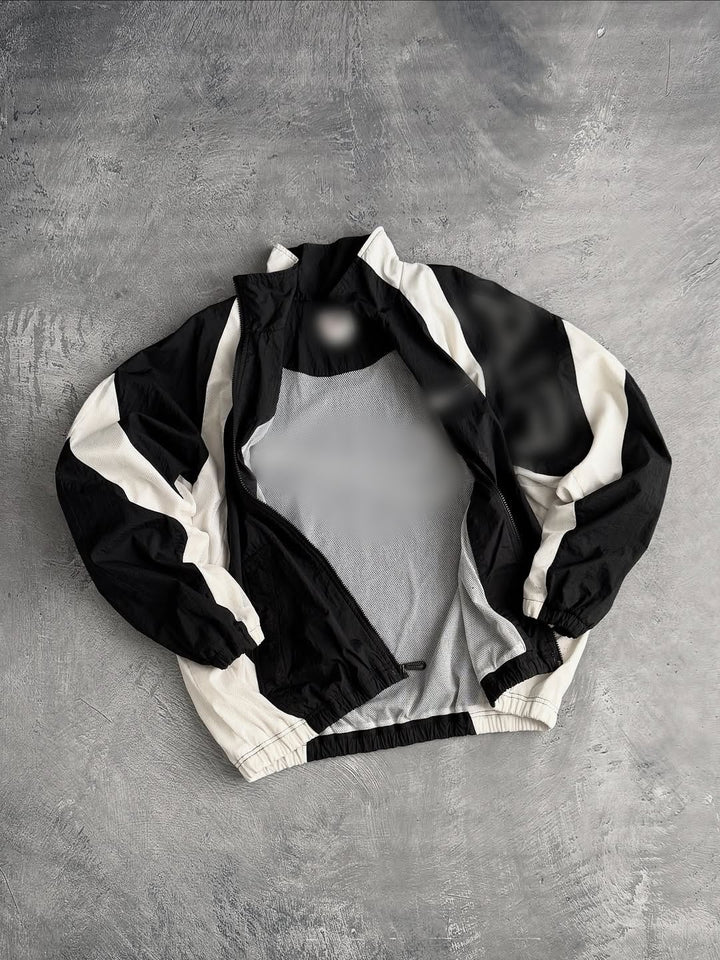 Unisex nan breathable lightweight wind and training jacket with mesh lining, stand collar and elastic hem Mune Fashion