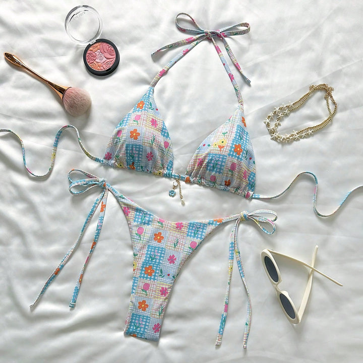 Ladies triangle bikini with playful flower details Mune Fashion