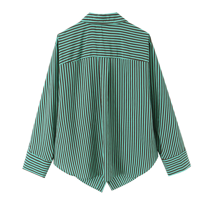 Women's oversized shirt blouse with diagonal stripe pattern, breast pocket, and asymmetrical hem.