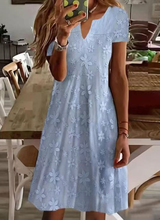 Women's knee-length A-line dress made of cotton blend with embroidered broderie overlay, short sleeves and V-neck Mune Fashion