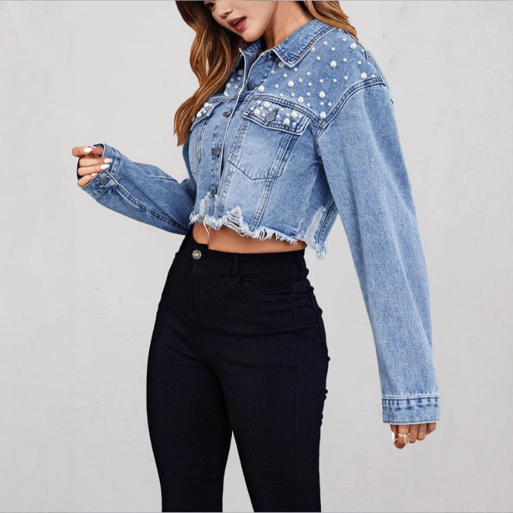Ladies short denim jacket with pearl embellishments, fringed hem, and wide-cut sleeves Mune Fashion