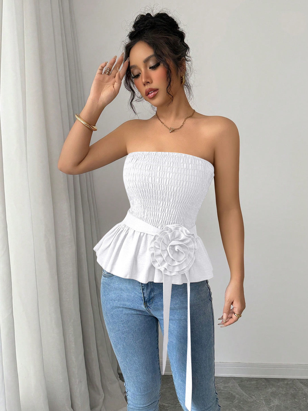 Women's fitted strapless Smok top with ruffle peplum and decorative fabric flower Mune Fashion