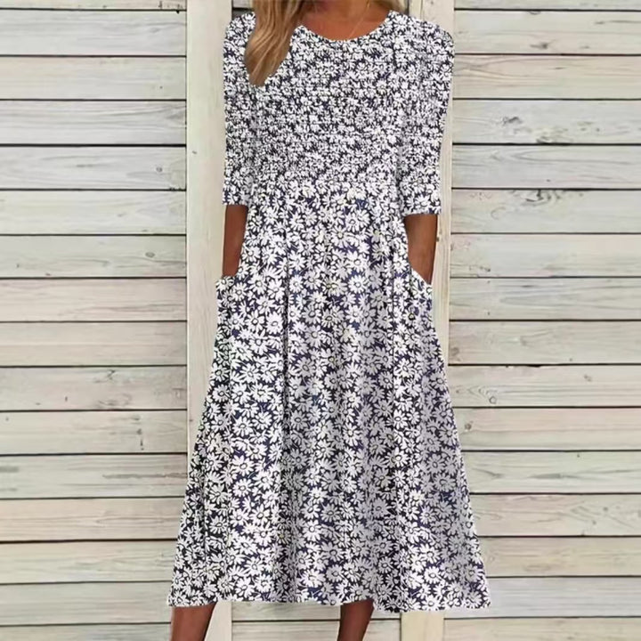 Ladies nan midi dress with ruched smock top, elbow sleeves, and practical side pockets Mune Fashion