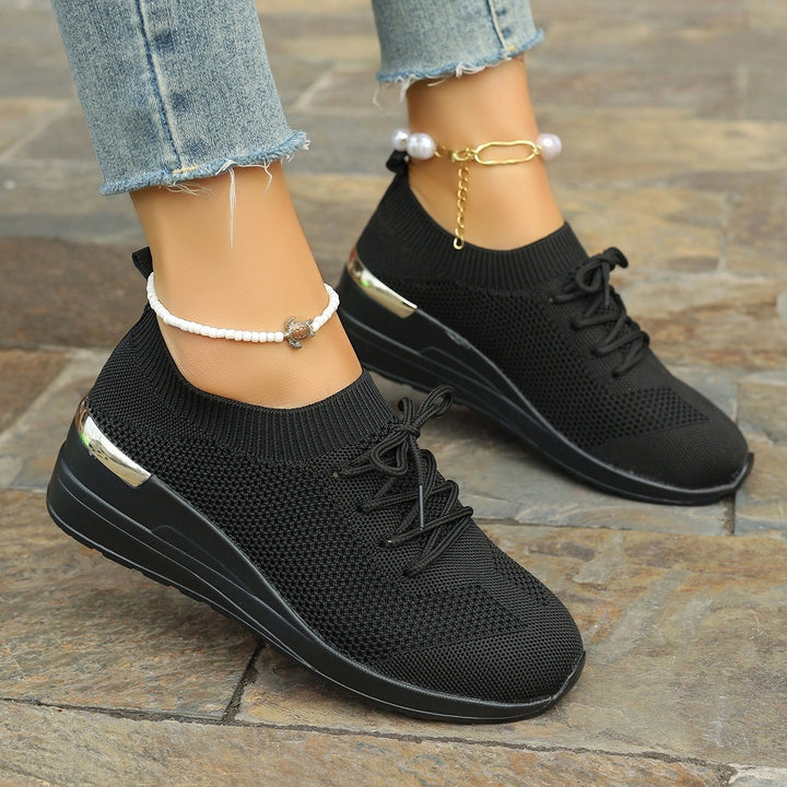 Women’s knit sneakers with wedge sole, sock-like shaft and metallic heel accent Mune Fashion