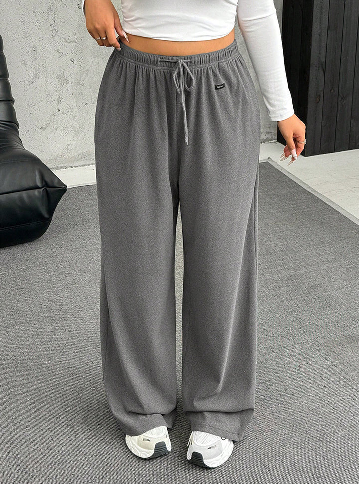 Women's wide relaxed pants with high waistband, elastic drawstring, and wide leg Mune Fashion