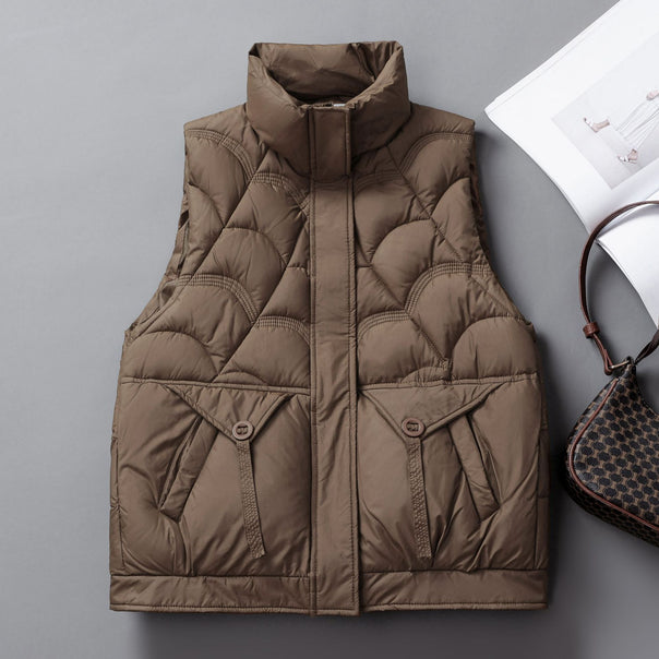 Women's quilted thermal vest with high stand collar, concealed front placket and large flap pockets Mune Fashion
