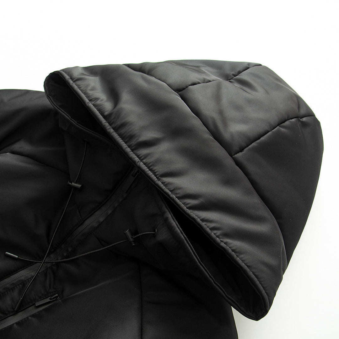 Women's short cut quilted jacket with high stand collar, wide funnel hood, and water-repellent surface Mune Fashion