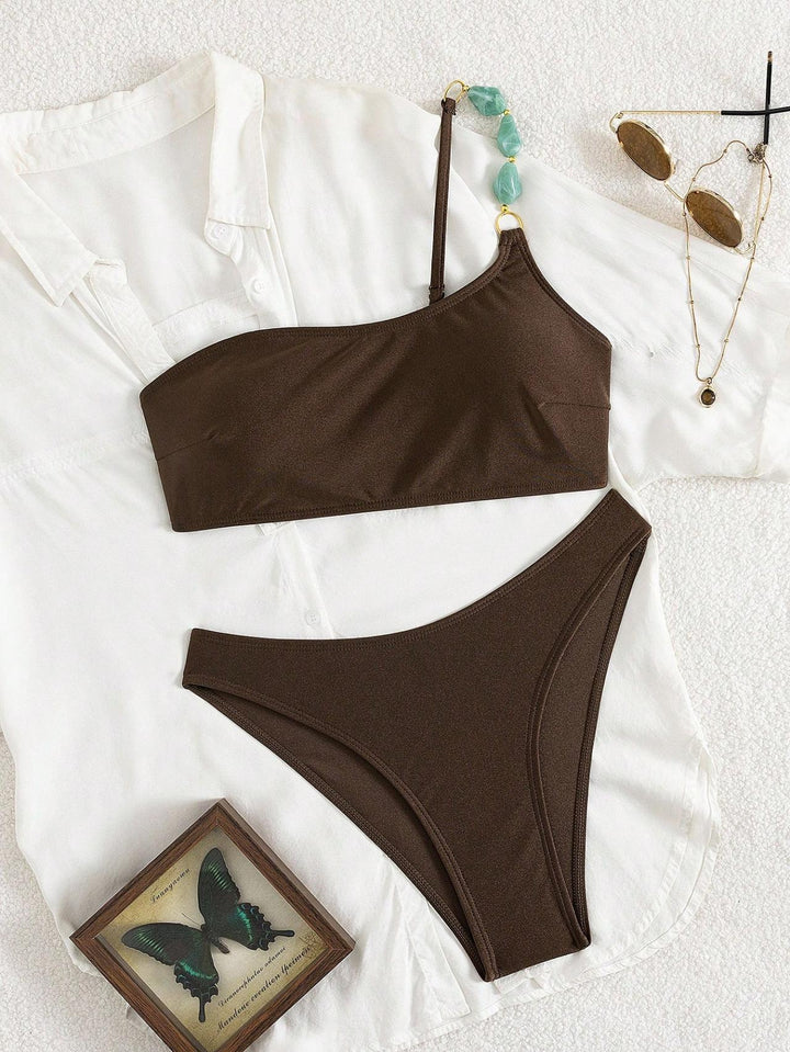 Women's One-Shoulder Bikini Set with Stylish Jewelry Detail Mune Fashion