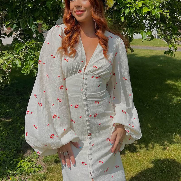 Ladies midi dress with puff sleeves, V-neckline and decorative button placket Mune Fashion