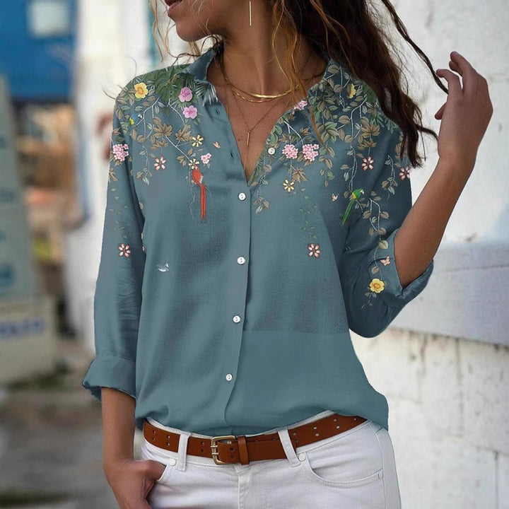 Women’s lightweight chiffon blouse with floral bird print, button placket and casual cut Mune Fashion