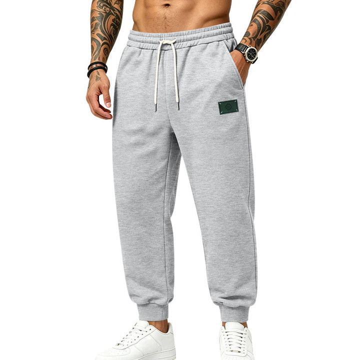 Men's casually cut sweat jogging pants with elastic waistband, drawstring, and cuffs Mune Fashion