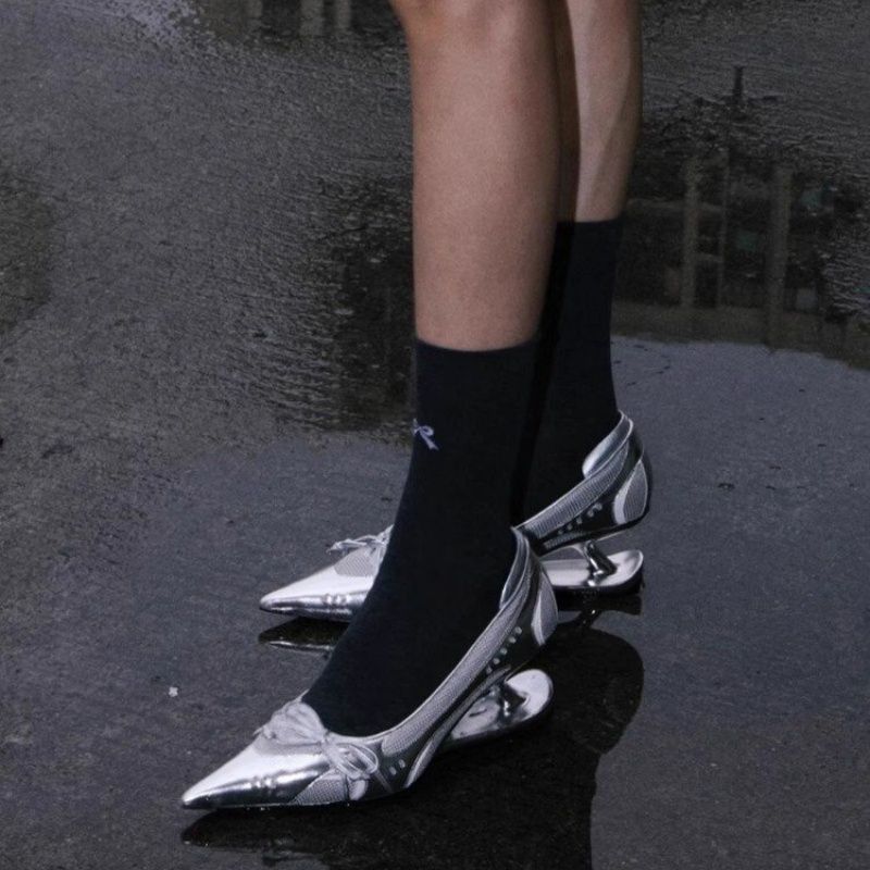 Women's pointed metallic slingback pumps with sculptural heel and bow accent Mune Fashion