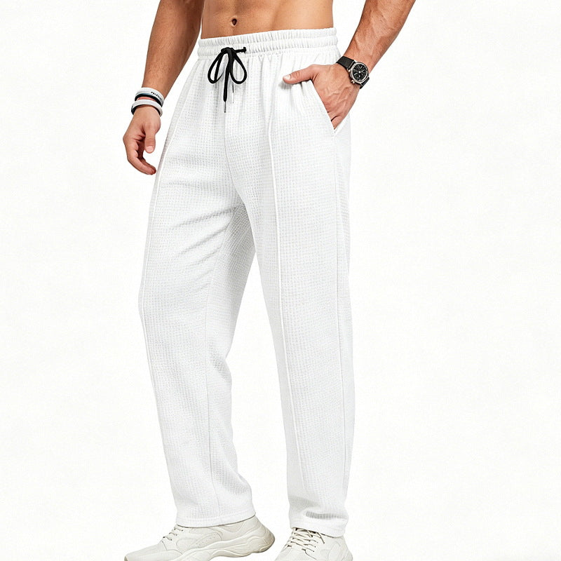 Men's straight-cut relaxed trousers with decorative center seam, elasticated drawstring waistband and side pockets Mune Fashion