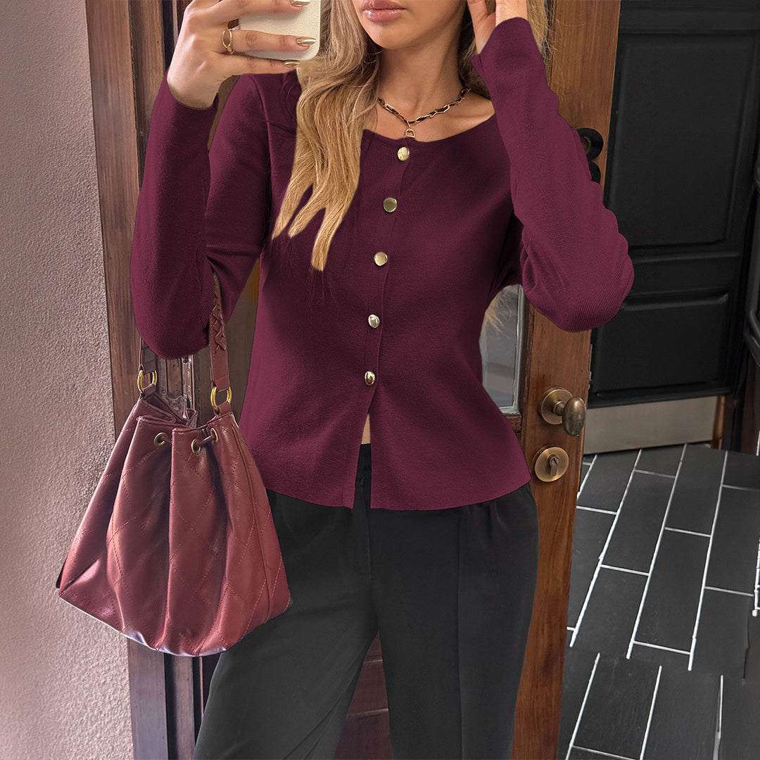 Women’s fitted fine knit cardigan with asymmetrical gold button placket and front slit Mune Fashion