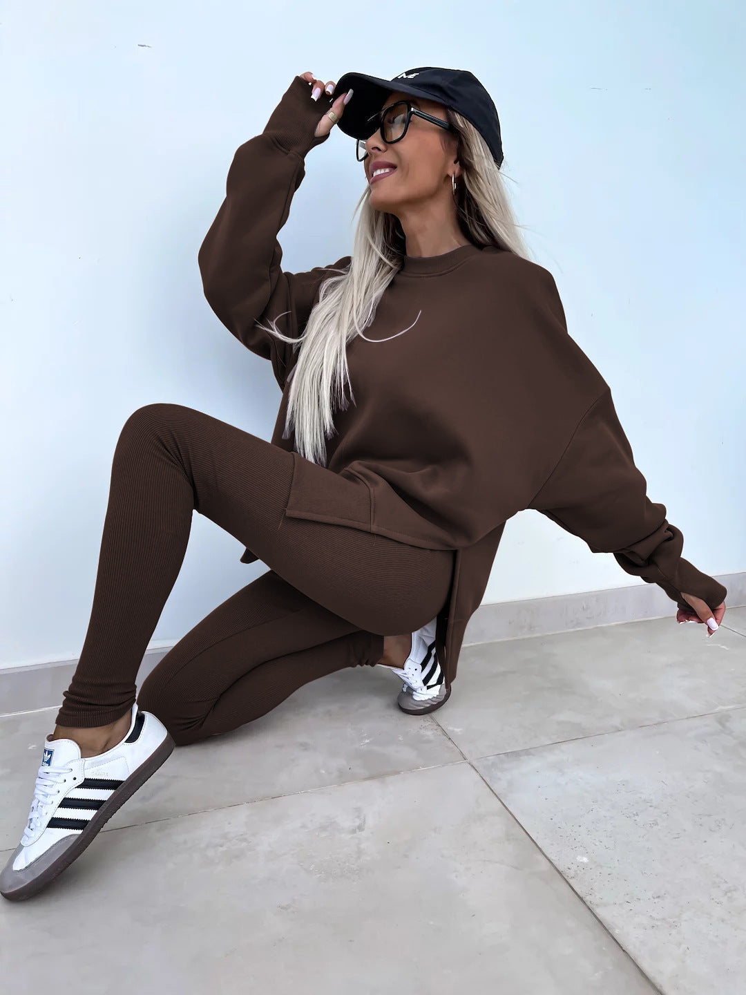 Women comfortable oversized lounge set with long sweatshirt, ribbed high-waist leggings and extended cuffs Mune Fashion