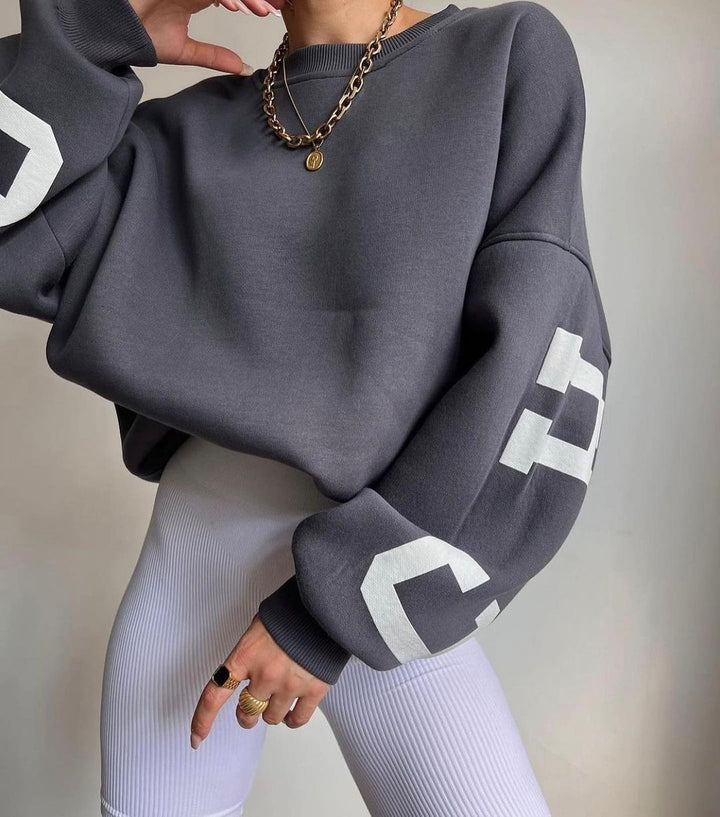 Women's Oversized Sweatshirt with Block Print Sleeves and Wide Drop Shoulder Cut Mune Fashion