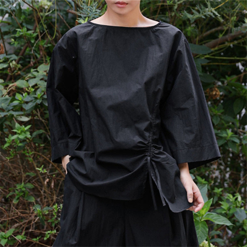 Women's oversized blouse with side cord gathering, bateau neckline, and wide sleeves Mune Fashion