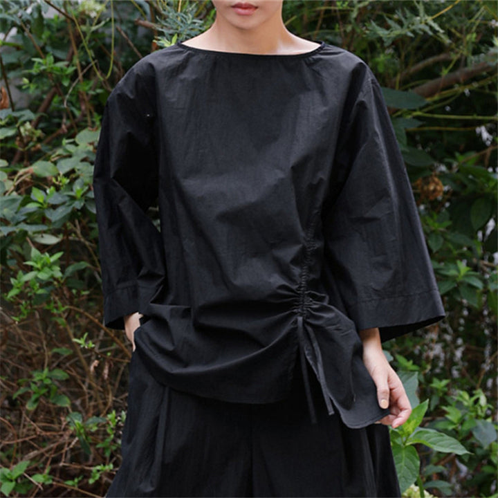 Women's oversized blouse with side cord gathering, bateau neckline, and wide sleeves Mune Fashion