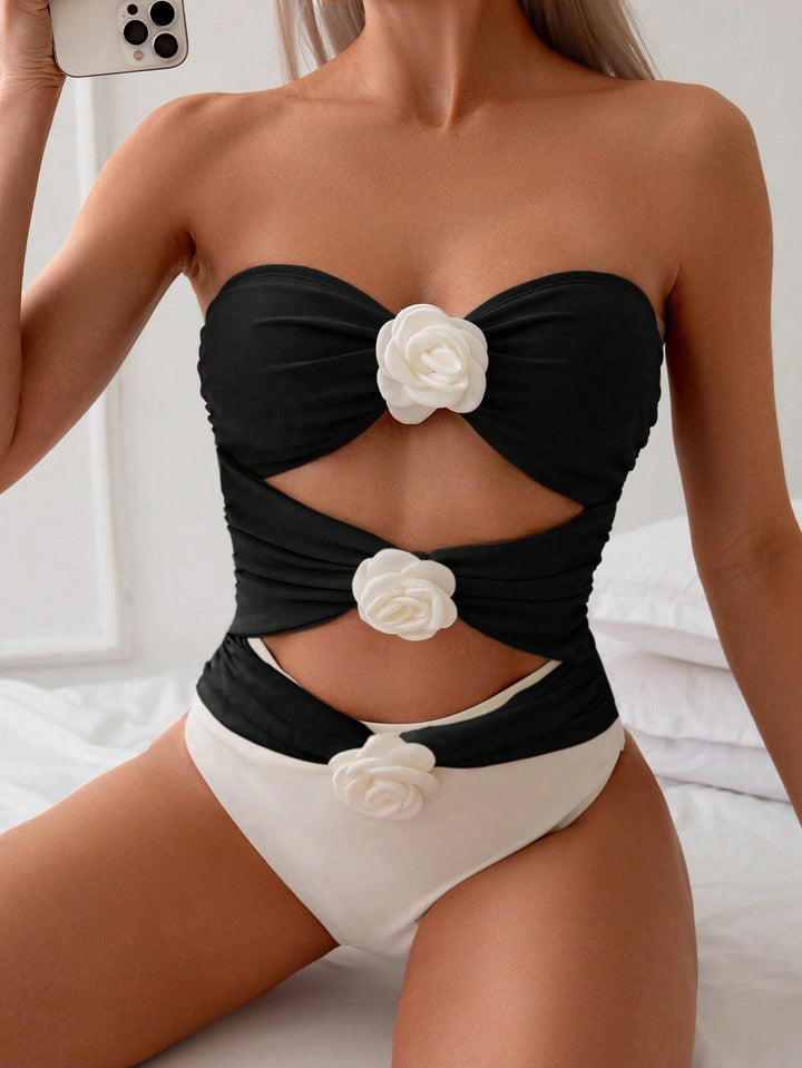 Women's bandeau swimsuit with elegant ruffles and floral accents Mune Fashion