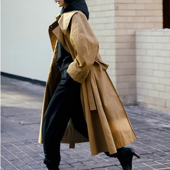 Women's Maxi Length Trench Coat with Oversized Shoulder Yoke, Waist Belt, and Voluminous Sleeves Mune Fashion