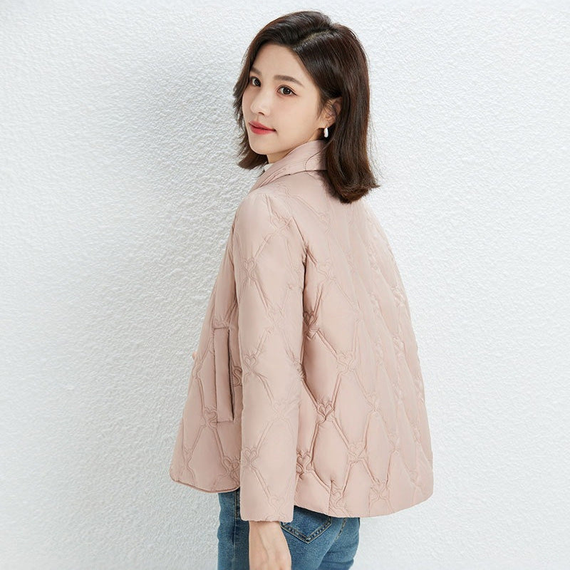 Women Short Cut Quilted Jacket with Decorative Stitching and Rounded Hem Mune Fashion