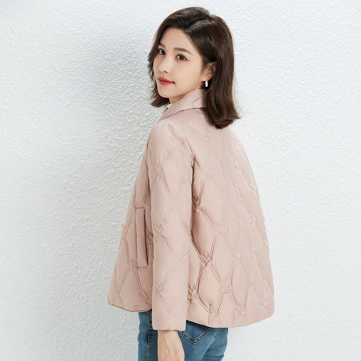 Women Short Cut Quilted Jacket with Decorative Stitching and Rounded Hem Mune Fashion