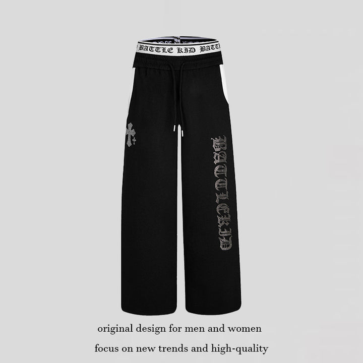 Women's wide lounge jogging pants with high logo waistband, gothic print and drawstring Mune Fashion