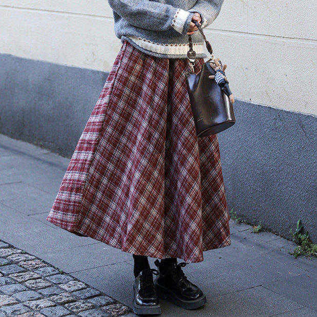 Women's flared checked midi skirt with a full drape and elasticated comfort waistband.