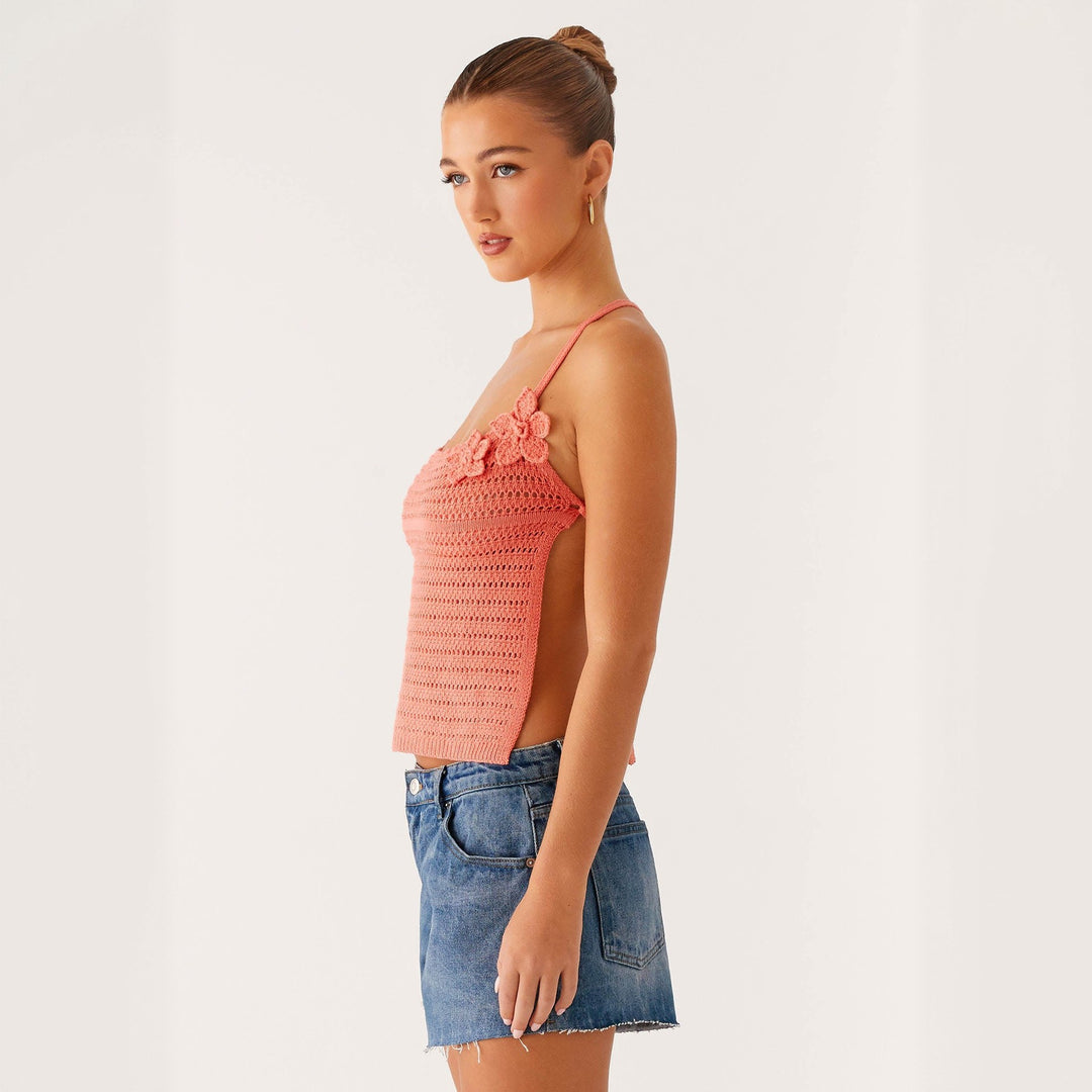 Women crochet top with floral accents Mune Fashion