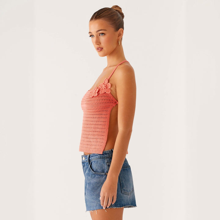 Women crochet top with floral accents Mune Fashion