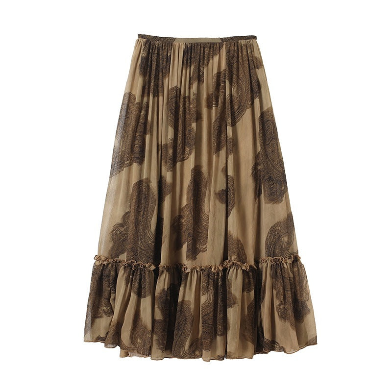 Women's maxi skirt made of chiffon with pleats, elastic waistband, and ruffled hem Mune Fashion