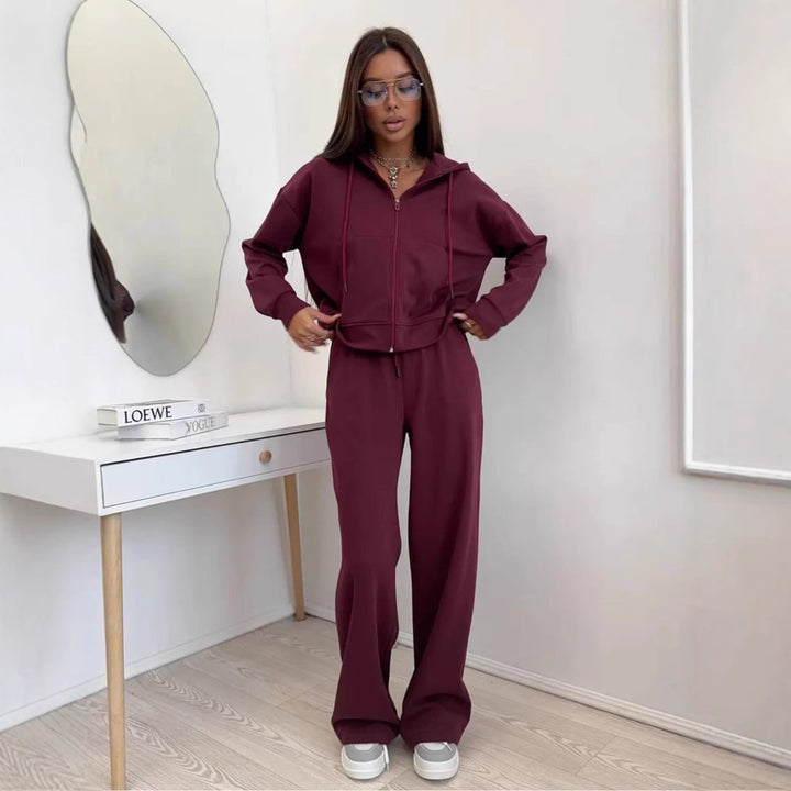 Women's loose high-waist lounge pants made of sweatshirt fabric with drawstring and side pockets Mune Fashion