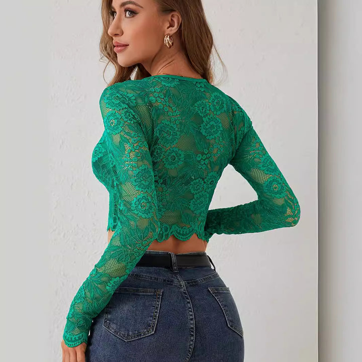 Women's cropped floral lace crop top with round neckline, long sleeves, and wavy hem Mune Fashion