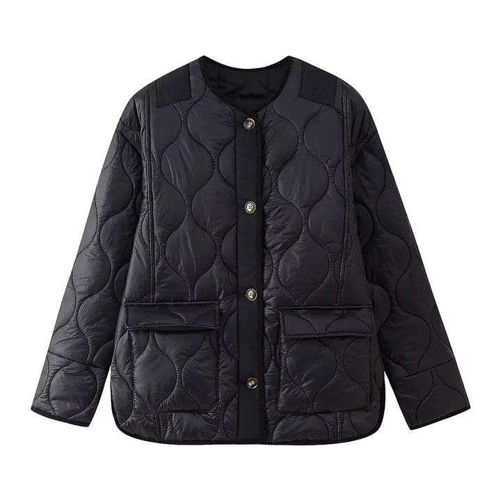 Women's light quilted transitional jacket with organic wave quilting, round neck, dropped shoulders, and flap pockets Mune Fashion