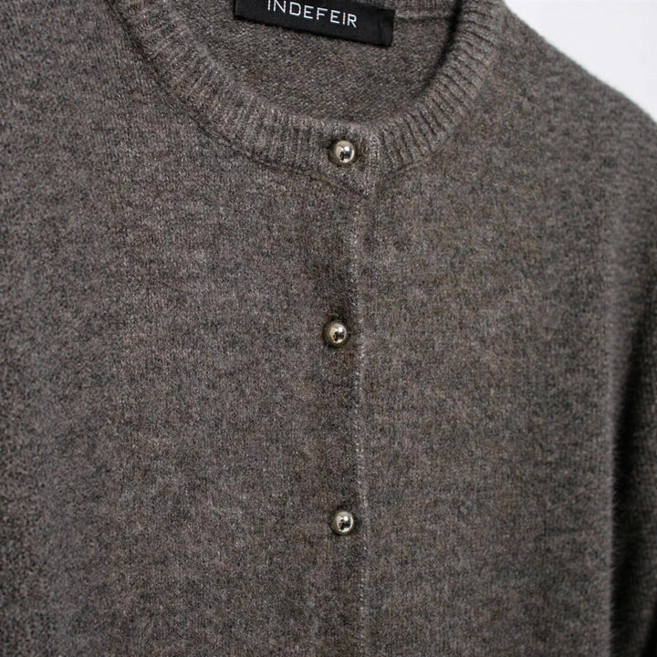 Women's fine knit cardigan with round neckline, continuous button placket, and slim silhouette Mune Fashion