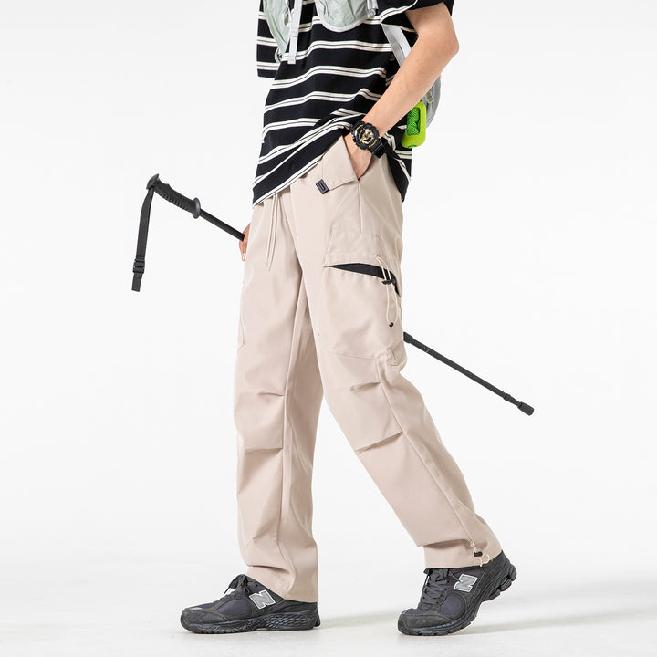 Men's Oversized Cargo Pants with Drawstring Waist, Multifunctional Flap and Leg Pockets, and Adjustable Cord Endings Mune Fashion
