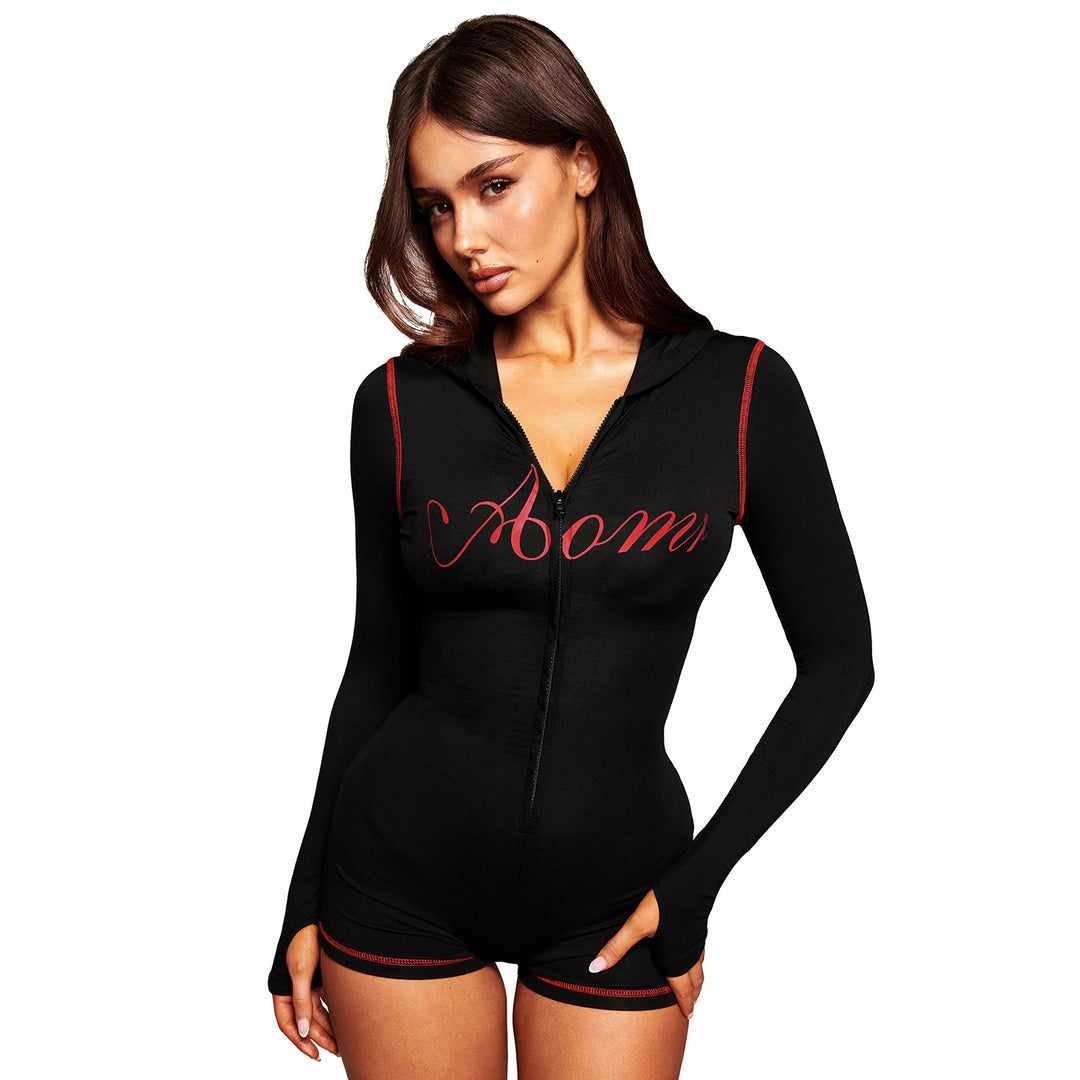 Women's tailored zip romper with hood, long sleeve design and integrated shorts made of functional stretch Mune Fashion