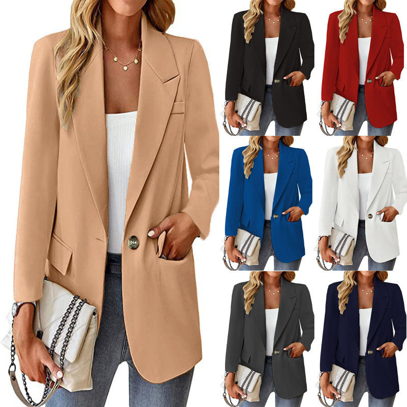 Ladies longline blazer in oversized style with a striking lapel, metal button, and patch pockets Mune Fashion